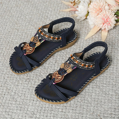 Aitana | Sandalias planas de mariposa
