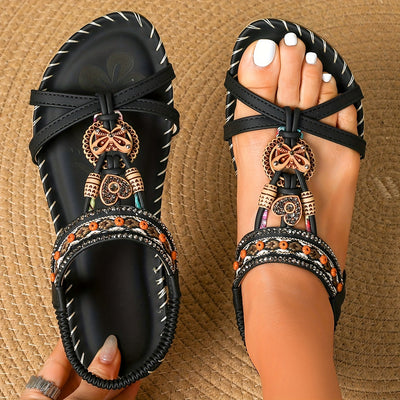 Aitana | Sandalias planas de mariposa